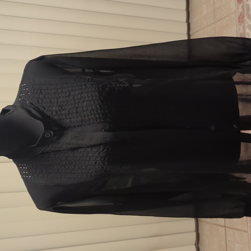 A black beaded sheer blouse